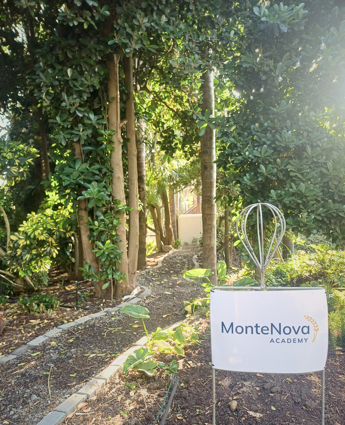 MonteNova garden pathway and sign outdoors